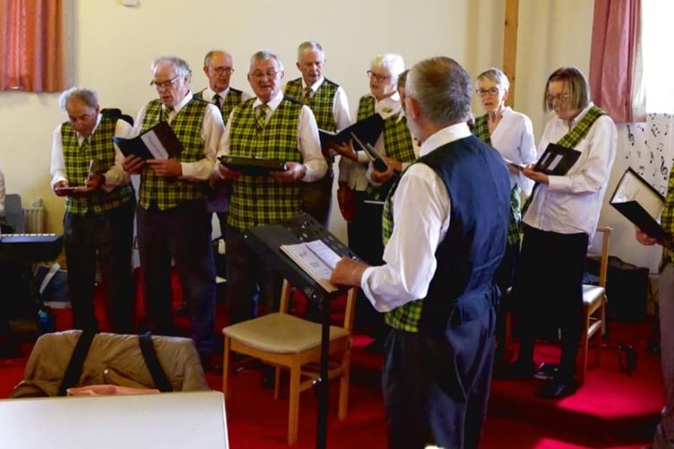 A choral group brought harmony to a popular Princetown community music festival.
