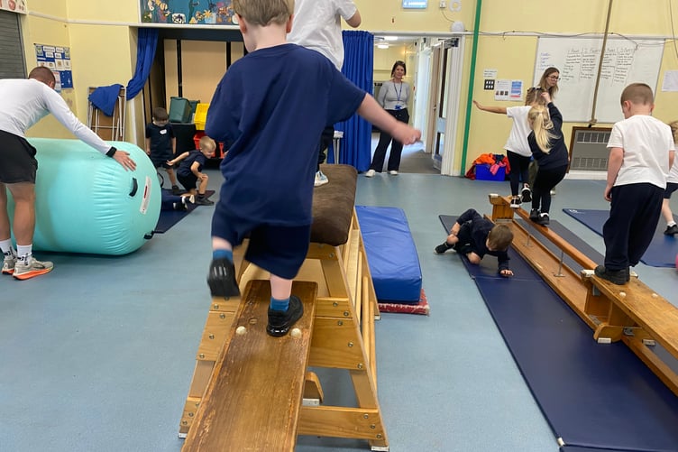 Learning balance at PE lessons at Whitchurch Primary School which is celebrating a national sporting award.