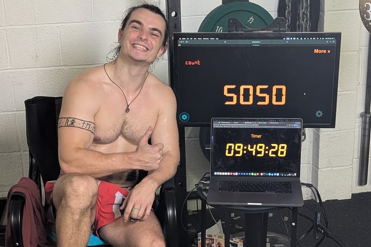 Gym fan Chris Tyrrell celebrates completing more than 5,000 pull-ups in a Tavistock gym.