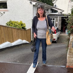 Couple 'marooned' by wet tarmac outside home 