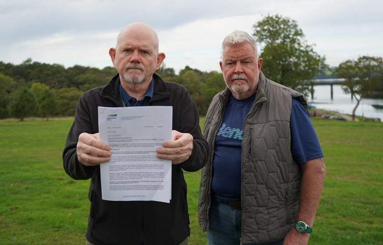 Cllrs Keith Moore and Ray Morton with their letter from South West Water, revealing that odour detctors had been broken for seven years.