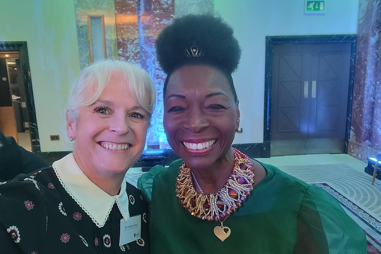 Heather Slyly, Tavistock Dartmoor Search & Rescue volunteer, at the Woman of the Year Award 2026, with VIP guest Baroness Floella Benjamin.