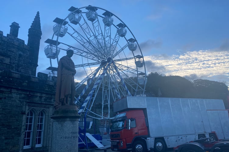 Tavistock Goose Fair is tomorrow and the fun fair giant wheel was being put up already early this morning.