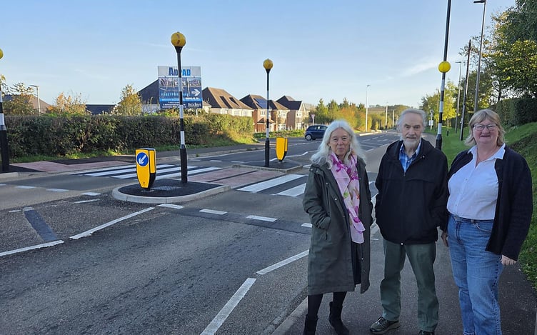 Standing proudly by the new crossing close to St James' Primary in Okehampton are Cllr Jacqi Hodgson, Cabinet member overseeing public transport for Devon County Council, Cllr Tony Leech, West Devon ward member for Okehampton North, and Cllr Caroline Mott, West Devon’s lead member for built environment.