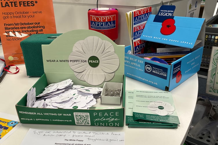 White 'peace poppies' are on offer from the Peace Pledge Union at Tavistock Library alongside the traditional red Royal British Legion poppies.