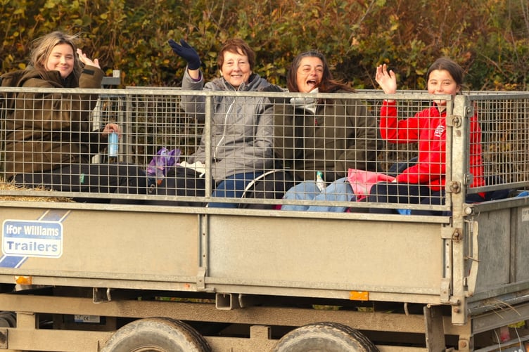 A happy group enjoy Fran Mudge's charity tractor run in a towed trailer. Picture by Chris Cottrell.
