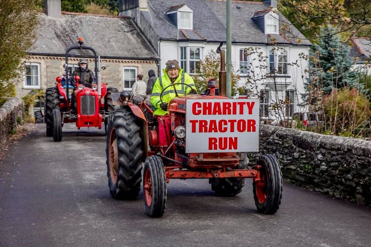 Veteran farmer Fran Mudge heads his charity tractor run through Horrabridge. Picture Sam Hussey.