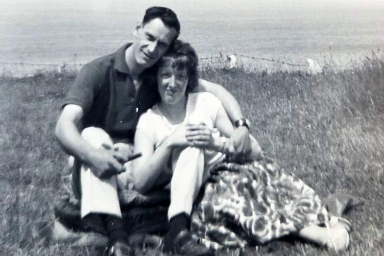 Joan and Ron Haycock pictured together in years gone by on a seaside cliff top. The couple celebrated 70 years of married life with a surprise party with friends and family in Bere Ferrers.